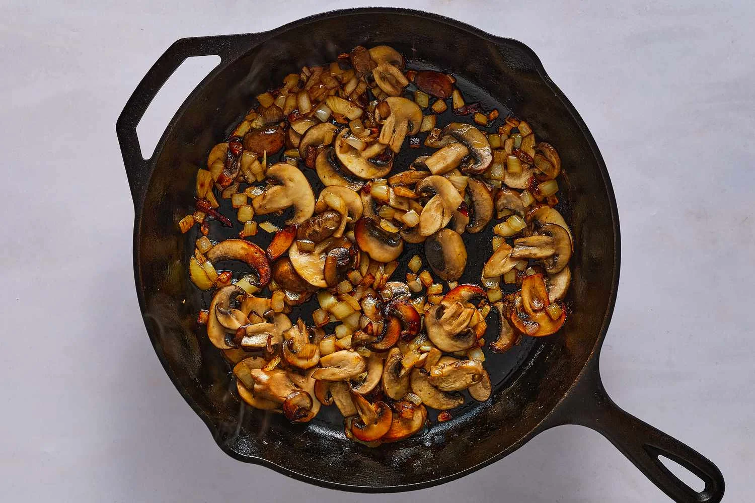 A skillet of cooked mushrooms