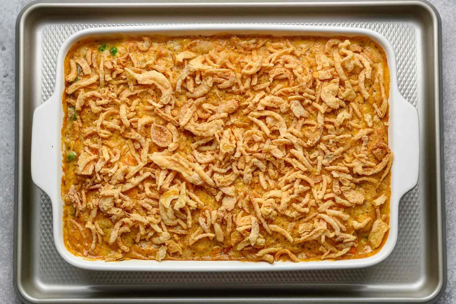 Chicken cobbler topped with fried onions