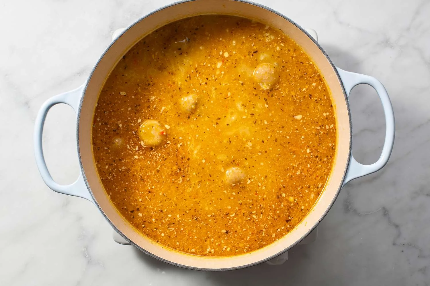 round plantain dumplings in soup pot 