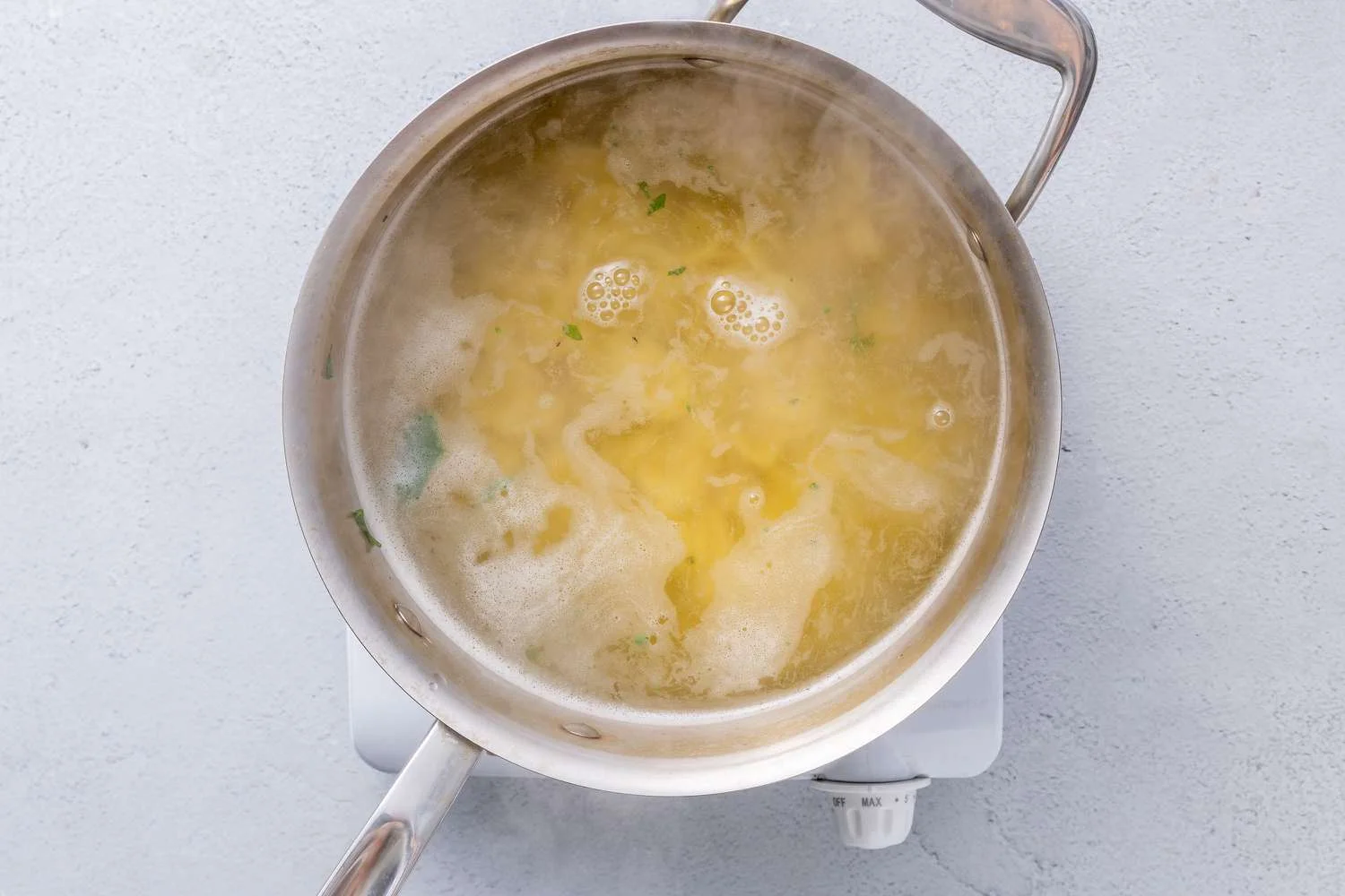 Orecchiette cooking in a pot of boiling water