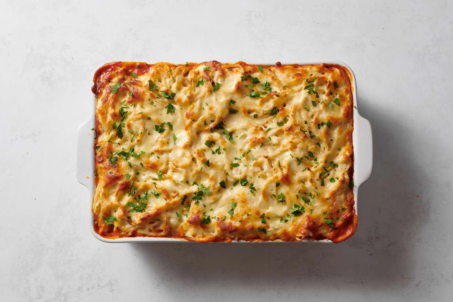 Million dollar pasta topped with parsley