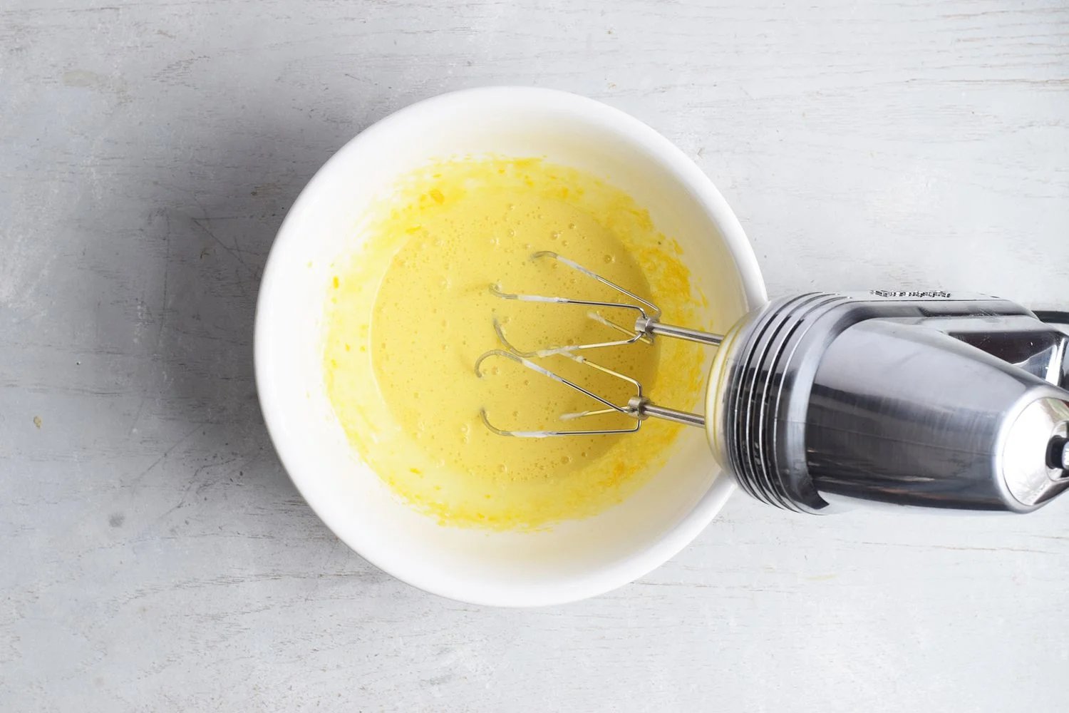 Mixture in a bowl with mixer