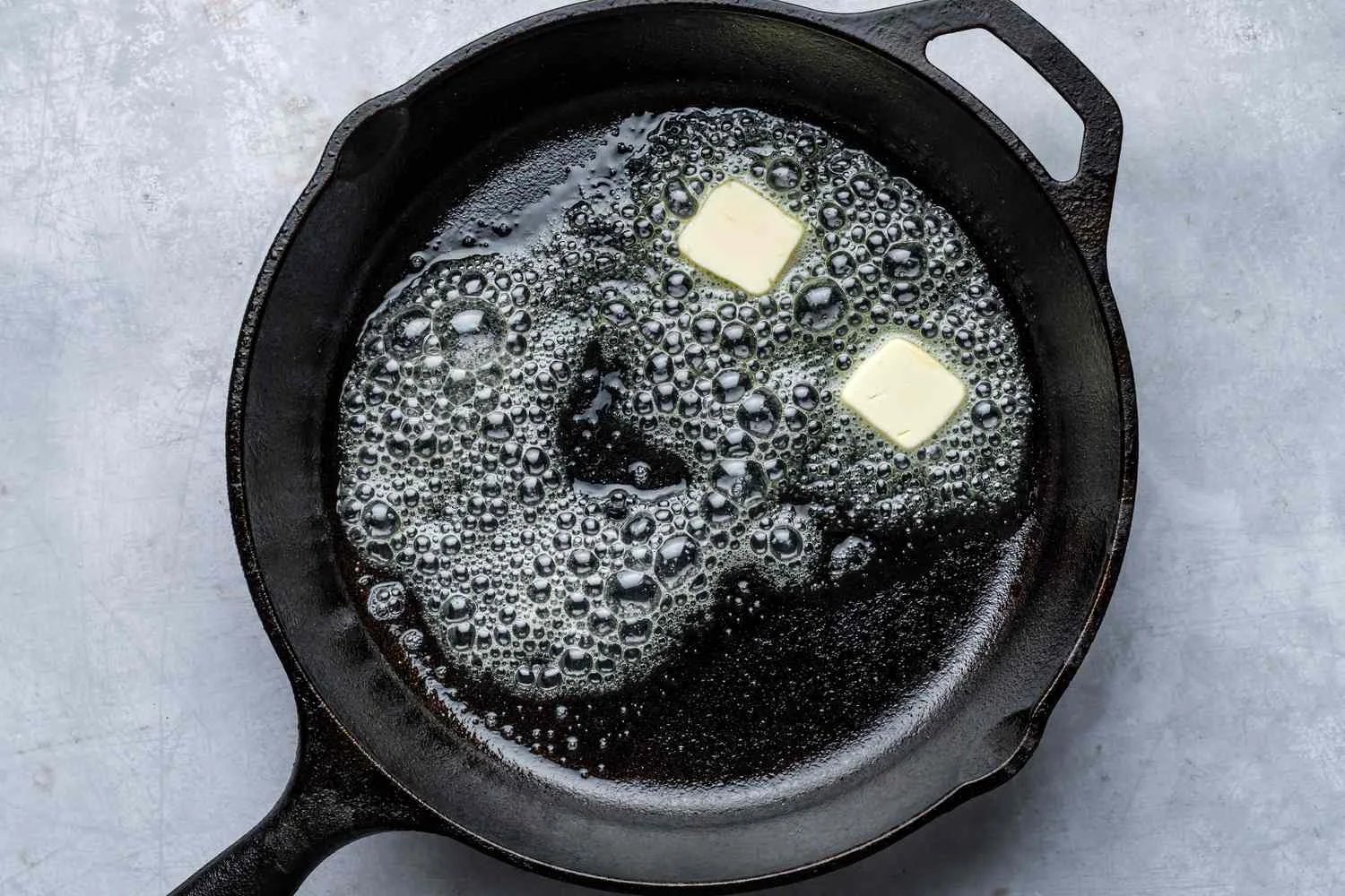 Butter melting in a hot skillet
