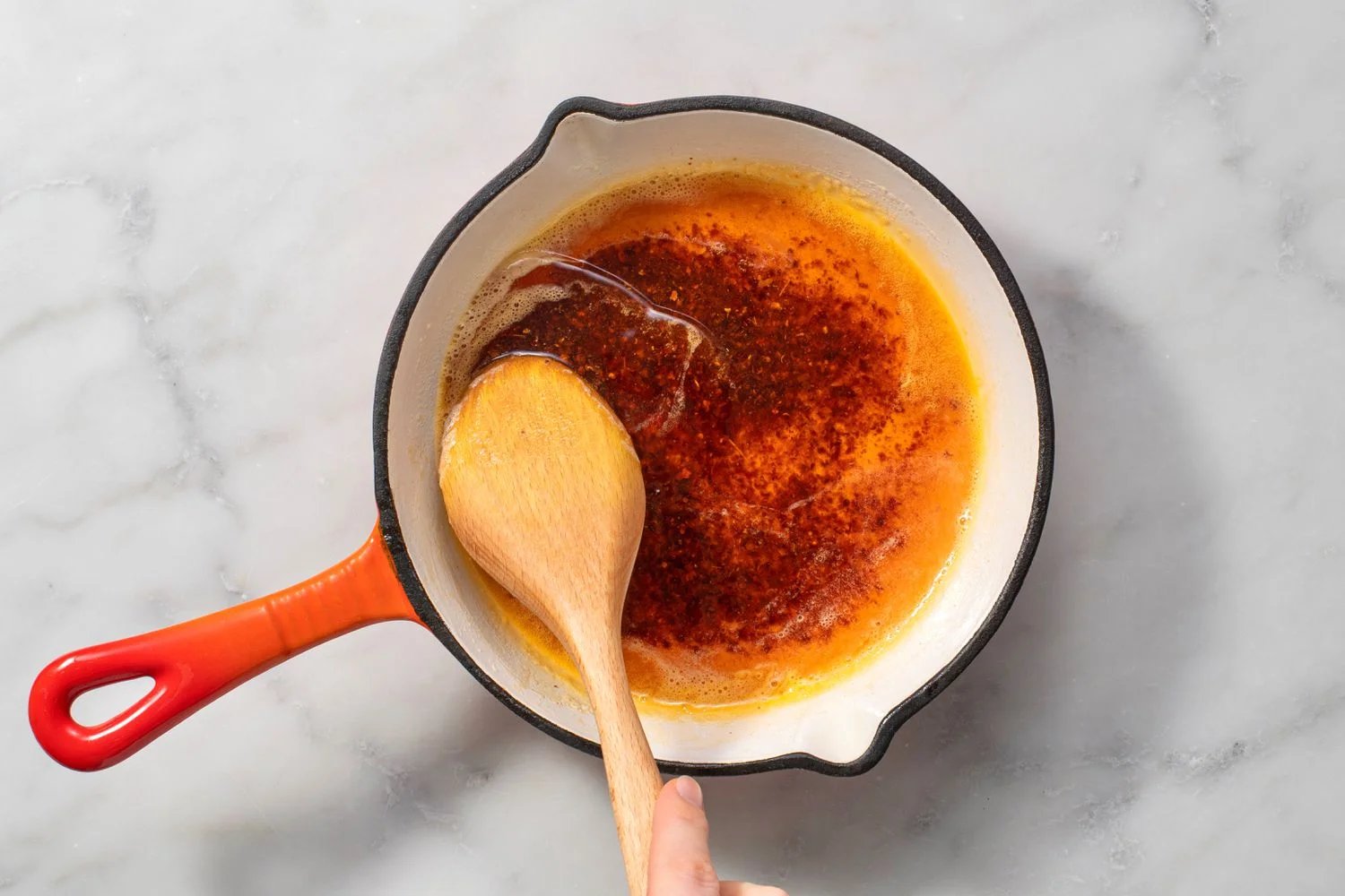 Brown butter with Aleppo pepper and cumin in a pan