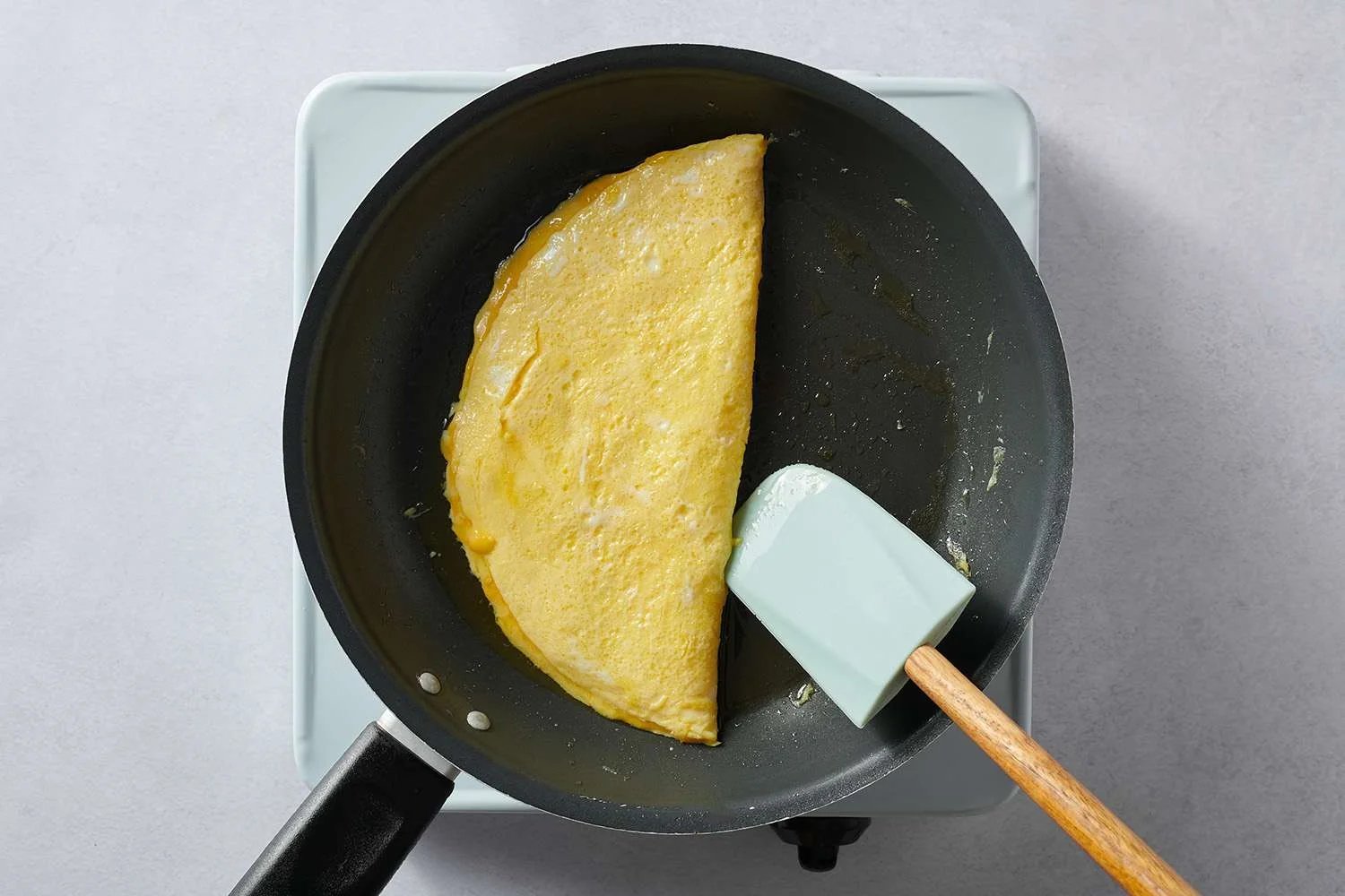 eggs cooking in skillet