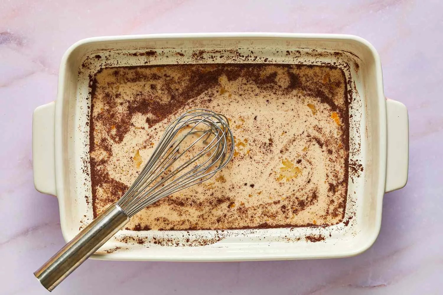 A shallow baking dish filled with custard
