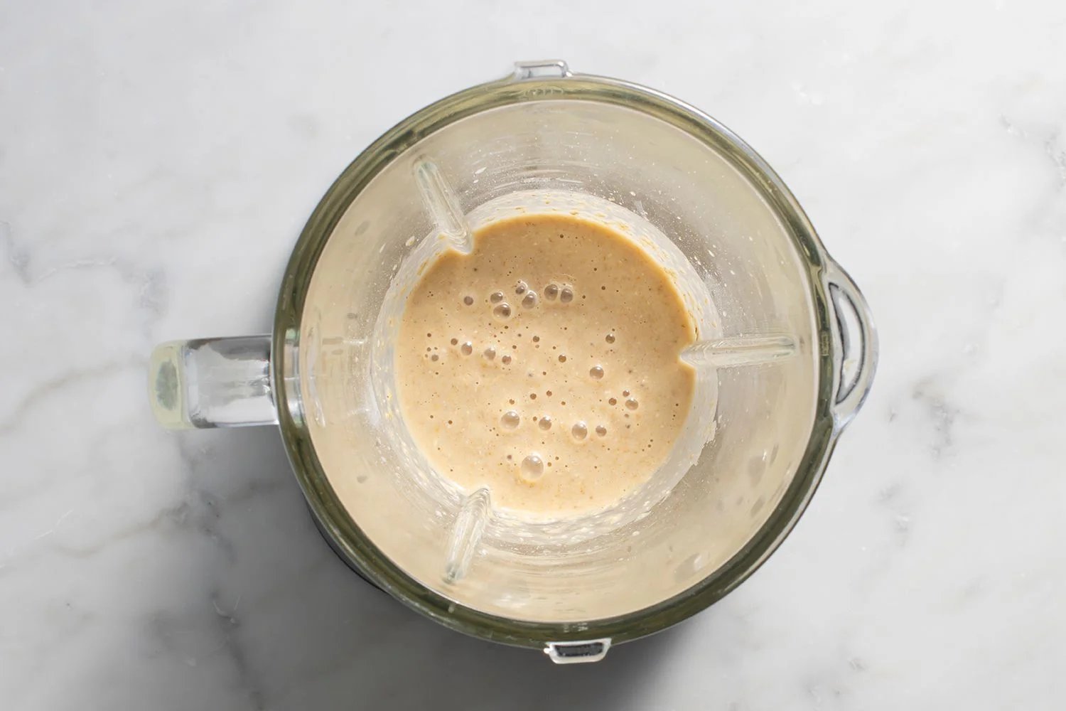 Egg, milk, sweetener, oats, baking powder, salt, and banana mixture in a blender